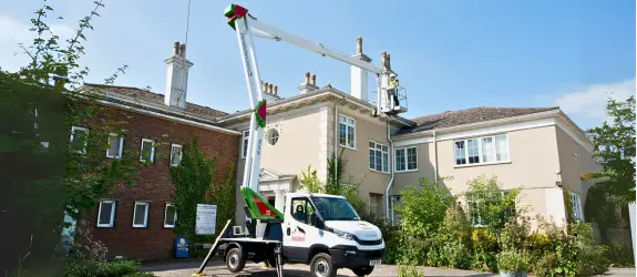 using our cherry picker on a commercial gutter cleaning job in Filwood, Scotland