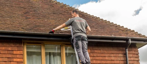 our team cleaning the gutters on a house in Stoke Bishop, Scotland